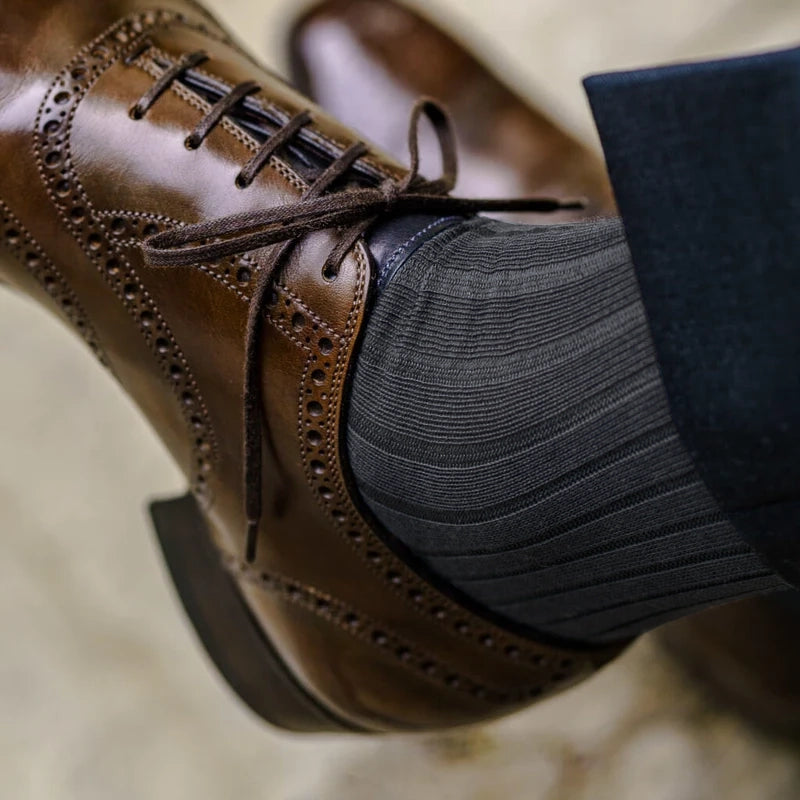 close up image of man wearing nice brown shoes and Grey Cotton Mid Calf Dress Socks