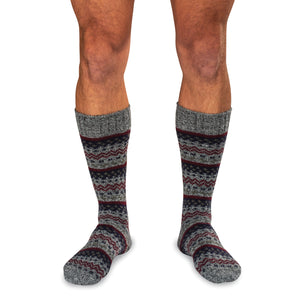 model wearing grey mid-calf length merino wool Fair Isle socks