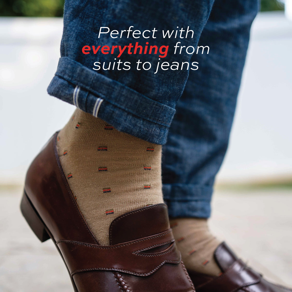 close up image of man standing out side wearing Colorful Square Knots on Khaki Merino Wool Over the Calf Dress Socks