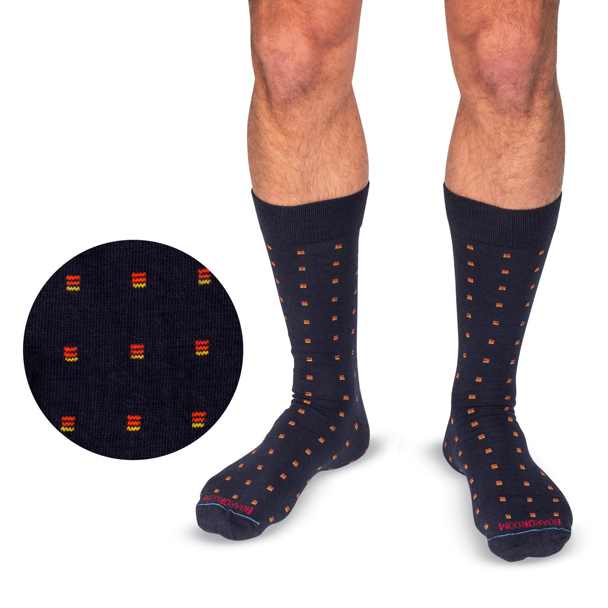 model wearing Orange Square Knots on Navy Merino Wool Mid Calf Dress Socks on a white background