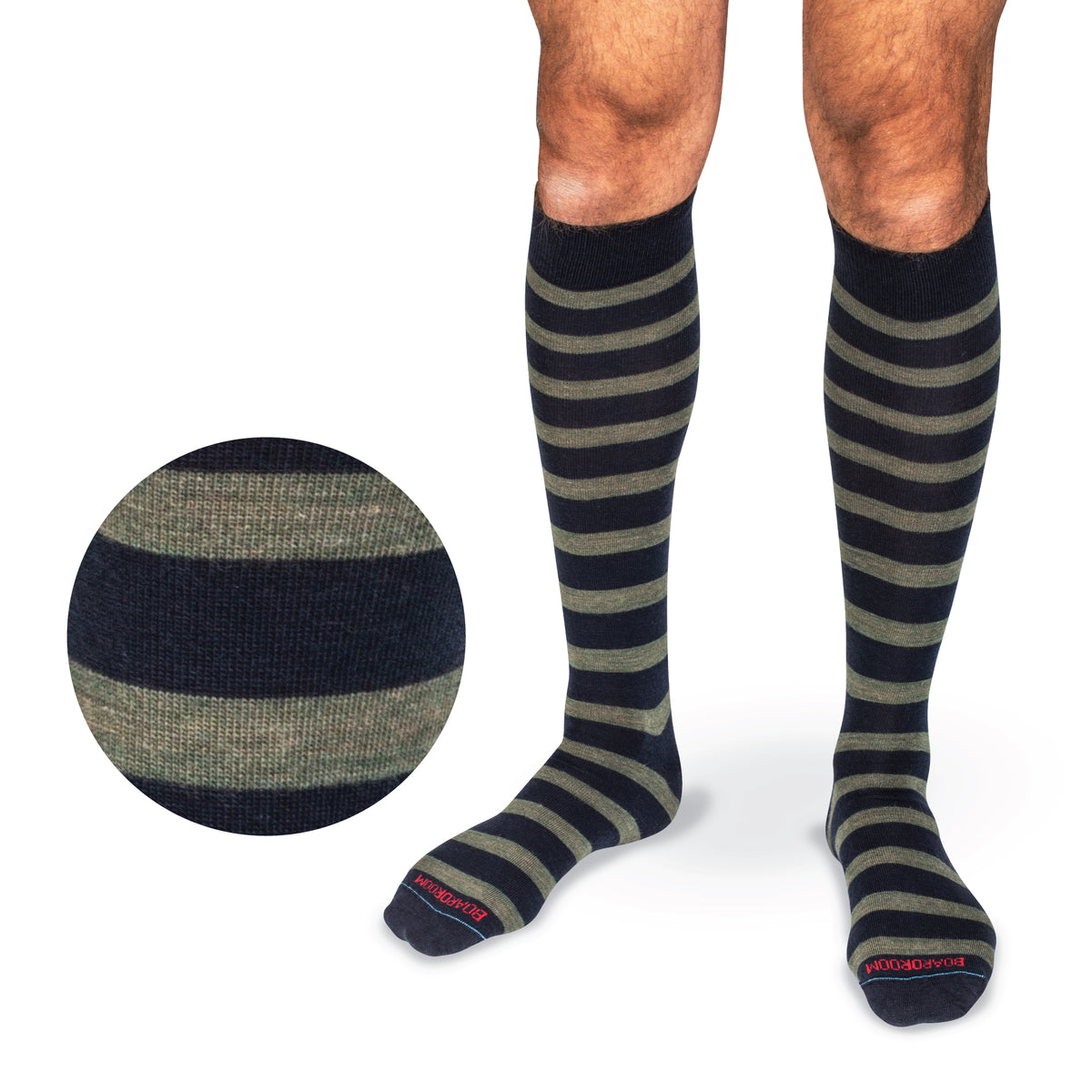 model wearing Olive Stripes on Navy Merino Wool Over the Calf Dress Socks on a white background