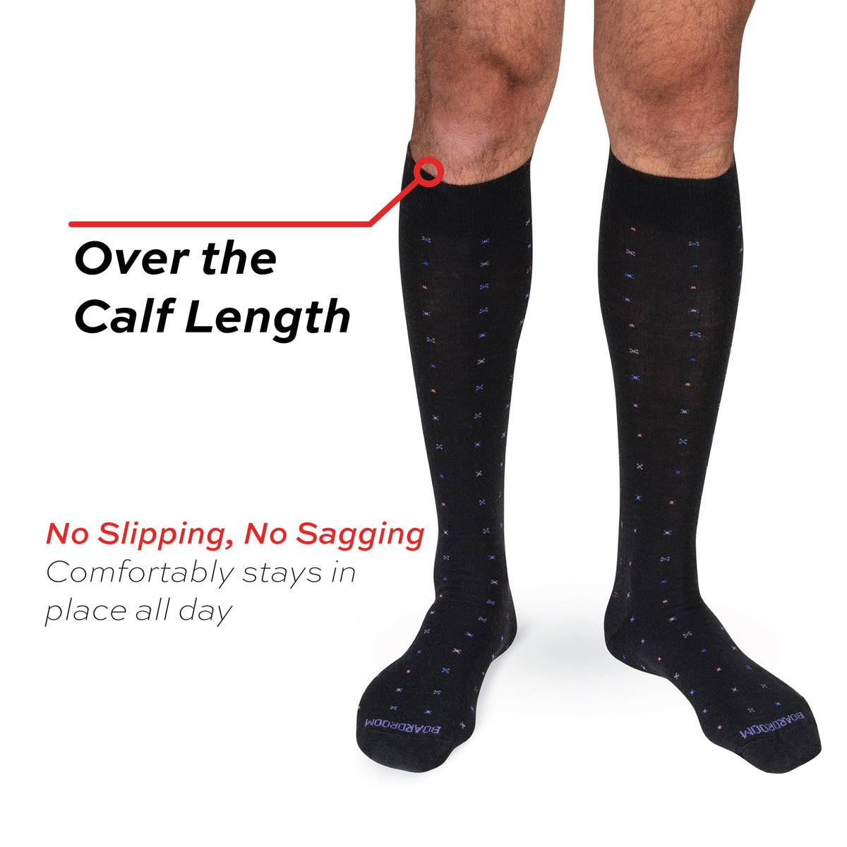 model wearing black over the calf geometric patterned dress sock with call out overlay