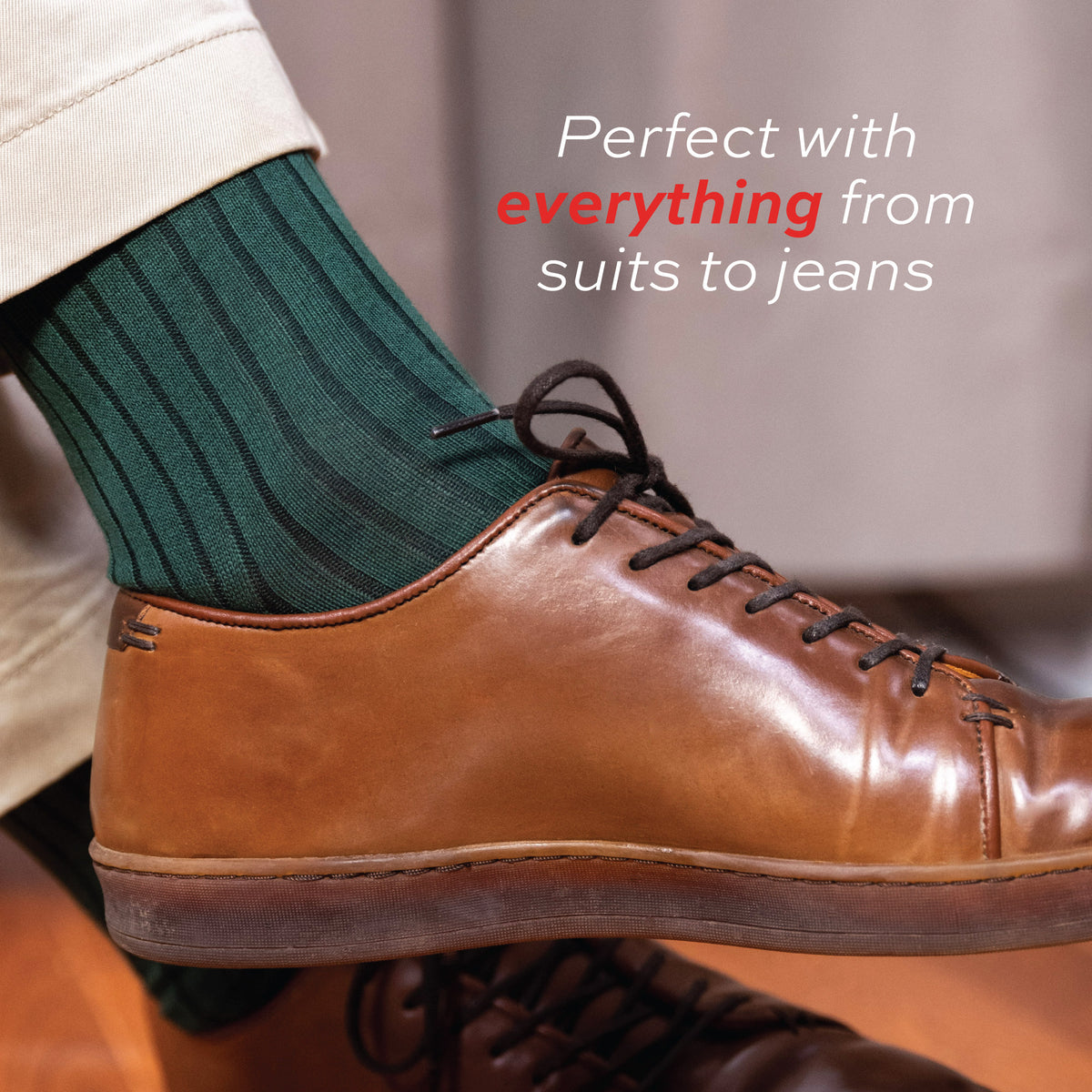 close up image of person wearing casual brown shoes, khaki pants and Forest Green Cotton Over the Calf Dress Socks