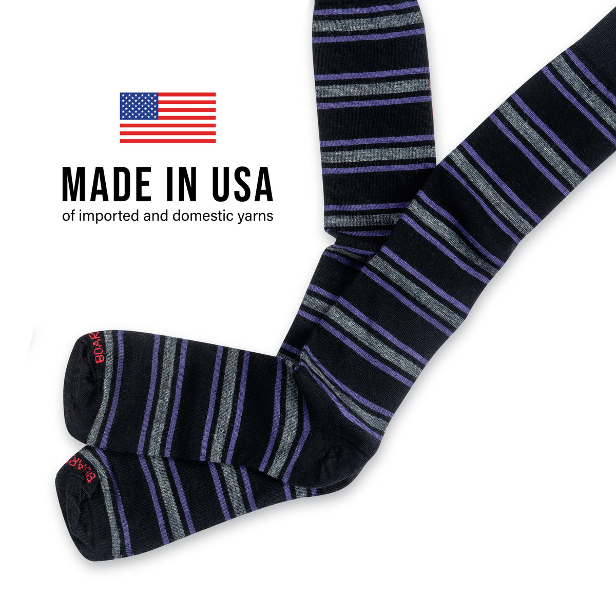a pair of Purple and Grey Stripes on Black Merino Wool Over the Calf Dress Socks flaying flat on a white background