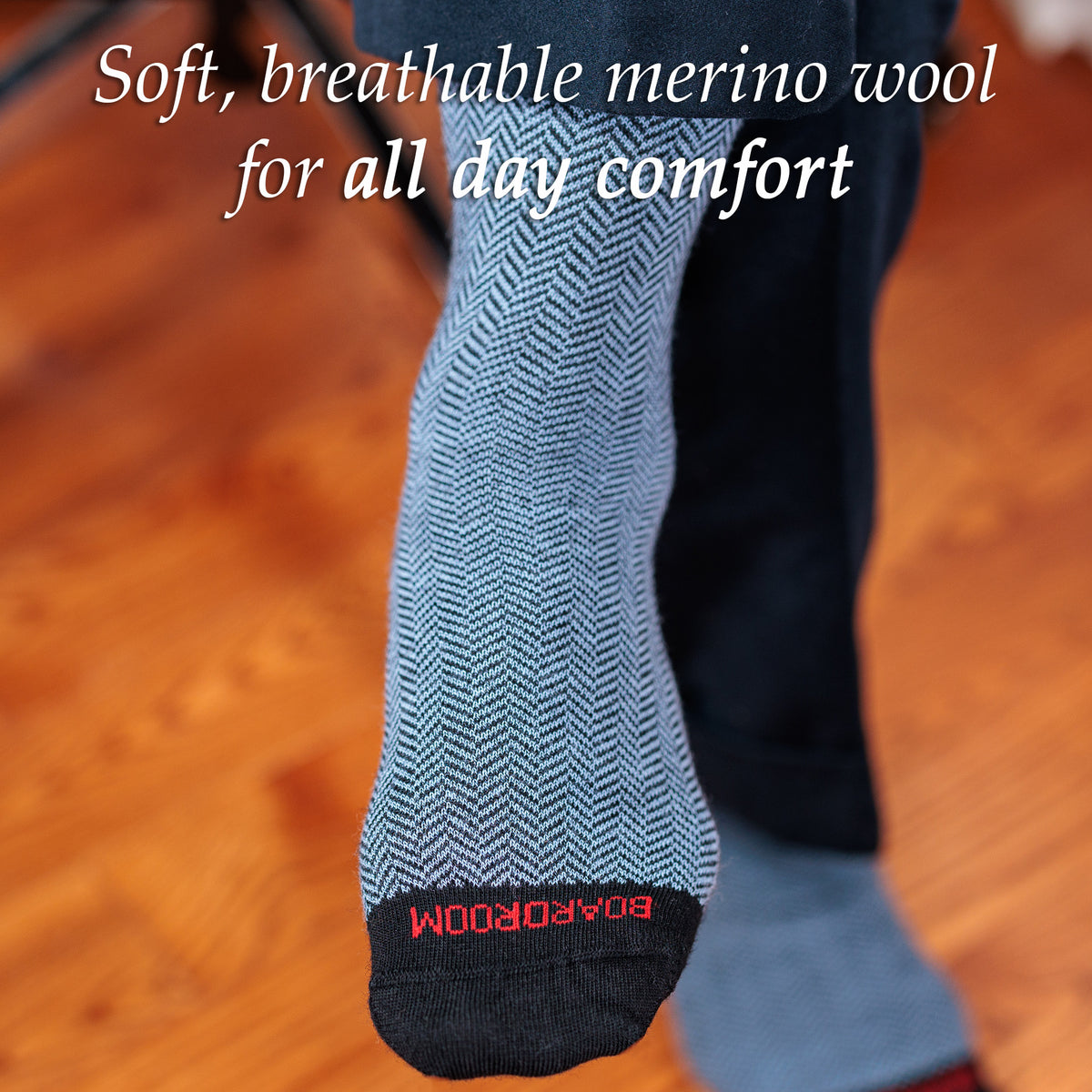 light blue and black herringbone dress socks with dark grey slacks