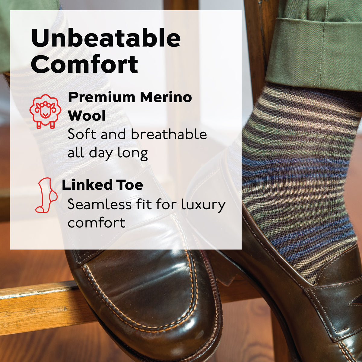 man sitting on stool wearing brown loafers and multi-color merino wool mens dress socks
