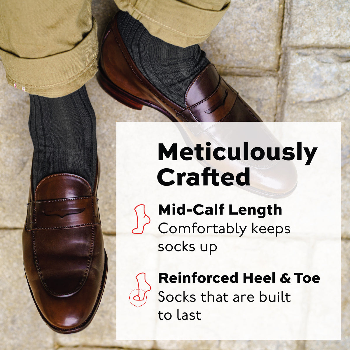 person sitting down on a stone walkway wearing khakis and Grey Cotton Mid Calf Dress Socks with nice shoes