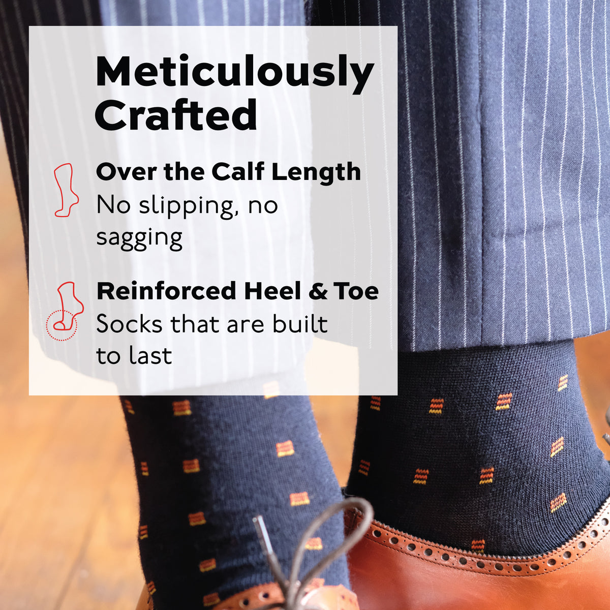 man standing on a hardwood floor wearing nice pants, shoes and Orange Square Knots on Navy Merino Wool Over the Calf Dress Socks