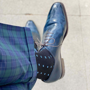 Black and Blue Patterned Dress Socks with Blue Dress Shoes and Plaid Pants