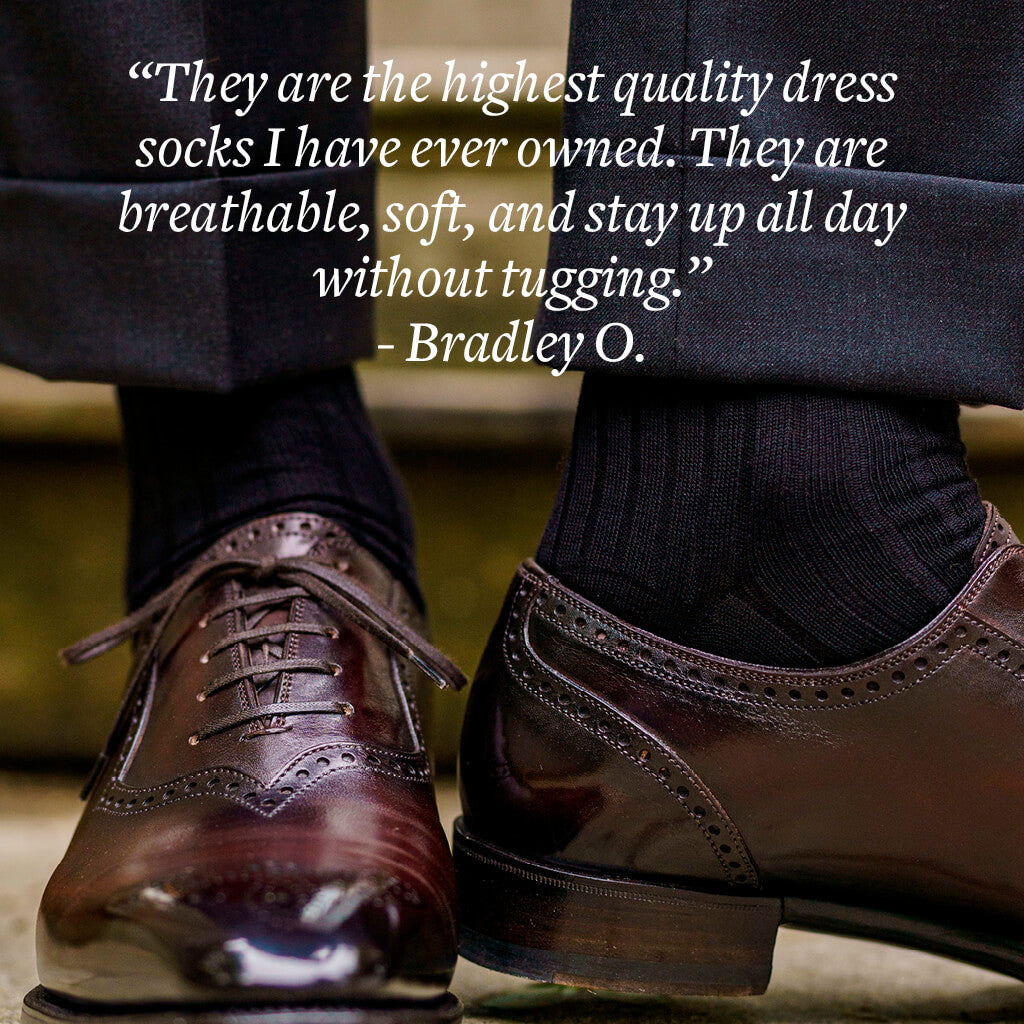 black cotton dress socks with dark grey trousers and brown brogue dress shoes