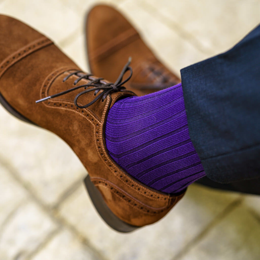 bright purple cotton over the calf dress socks with brown suede shoes and navy trousers