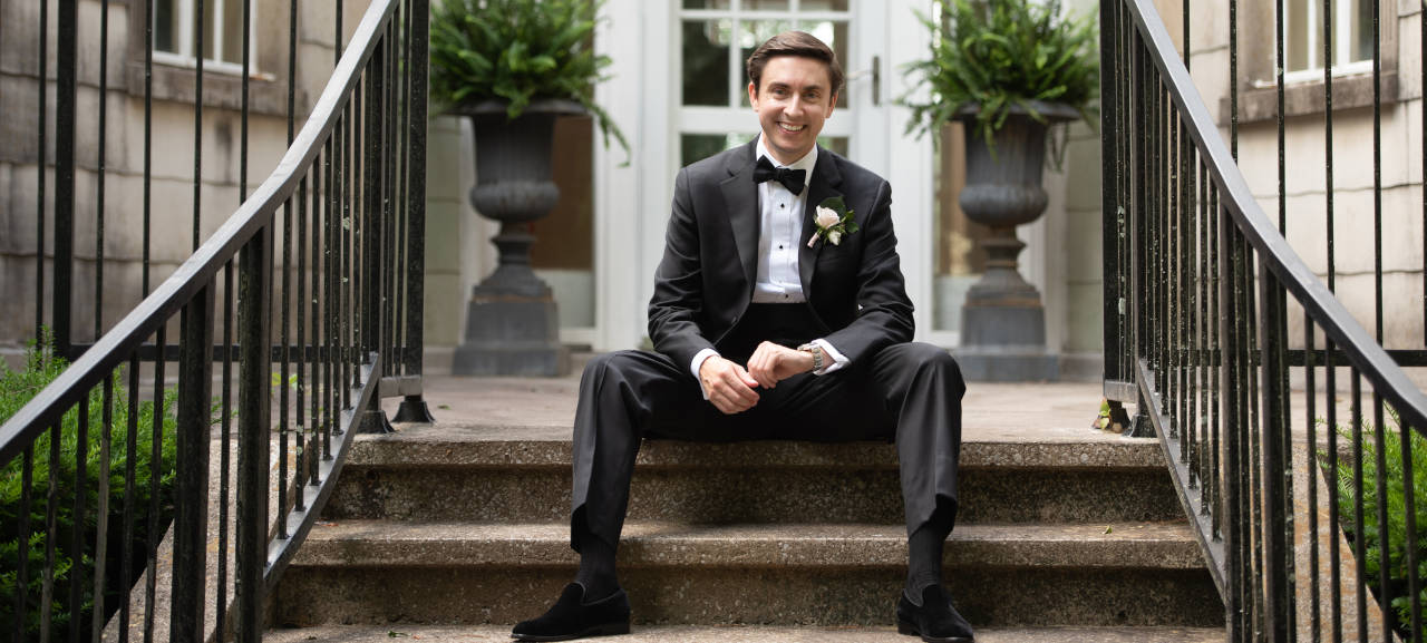 groom wearing black wedding dress socks