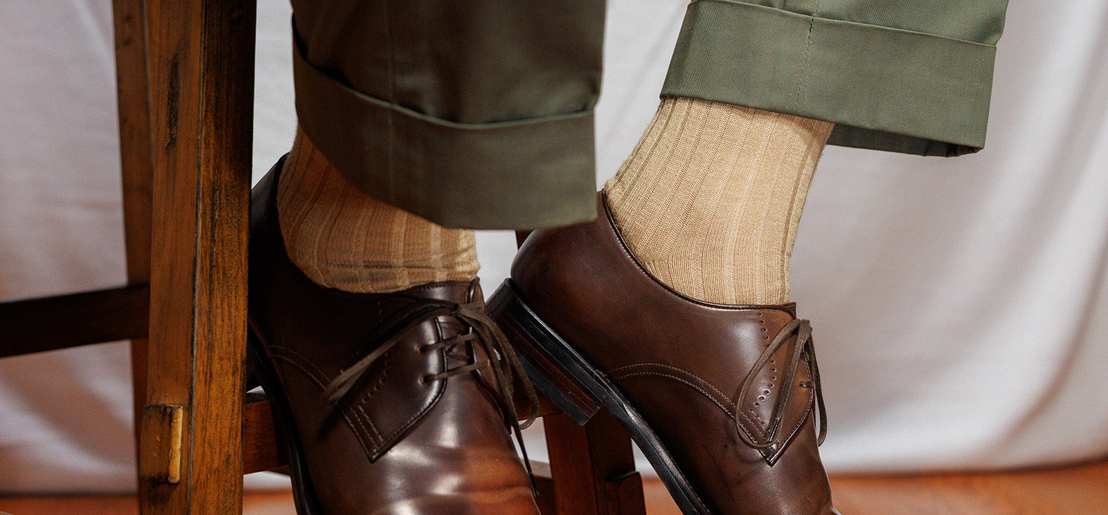 khaki merino wool ribbed dress socks with green slacks and brown derbies
