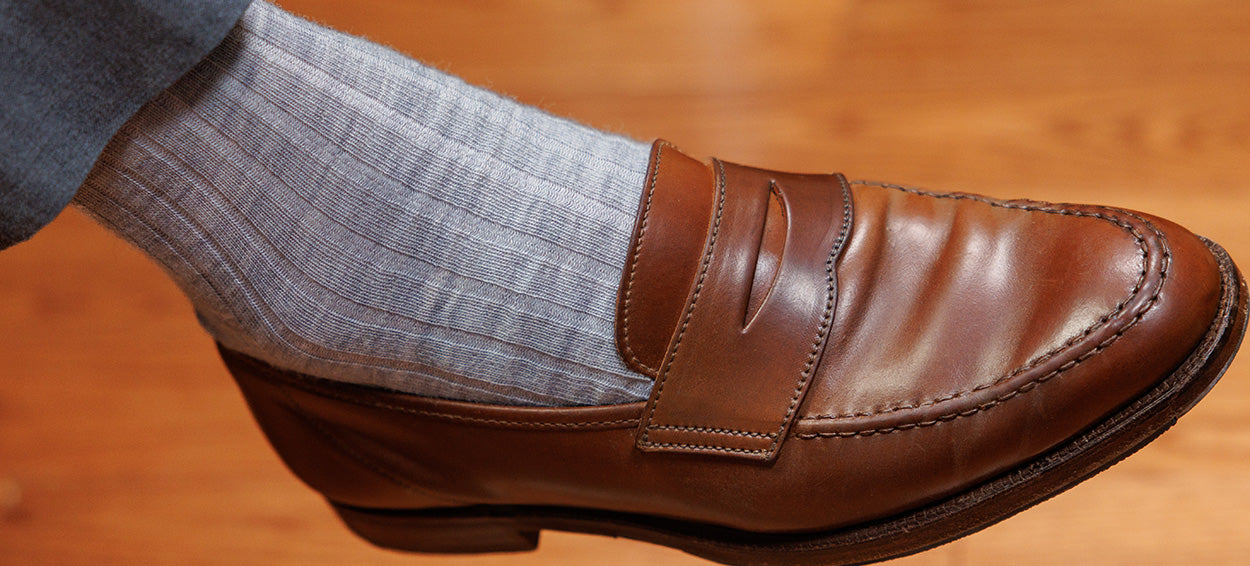 light grey heather dress socks with grey slacks and brown penny loafers