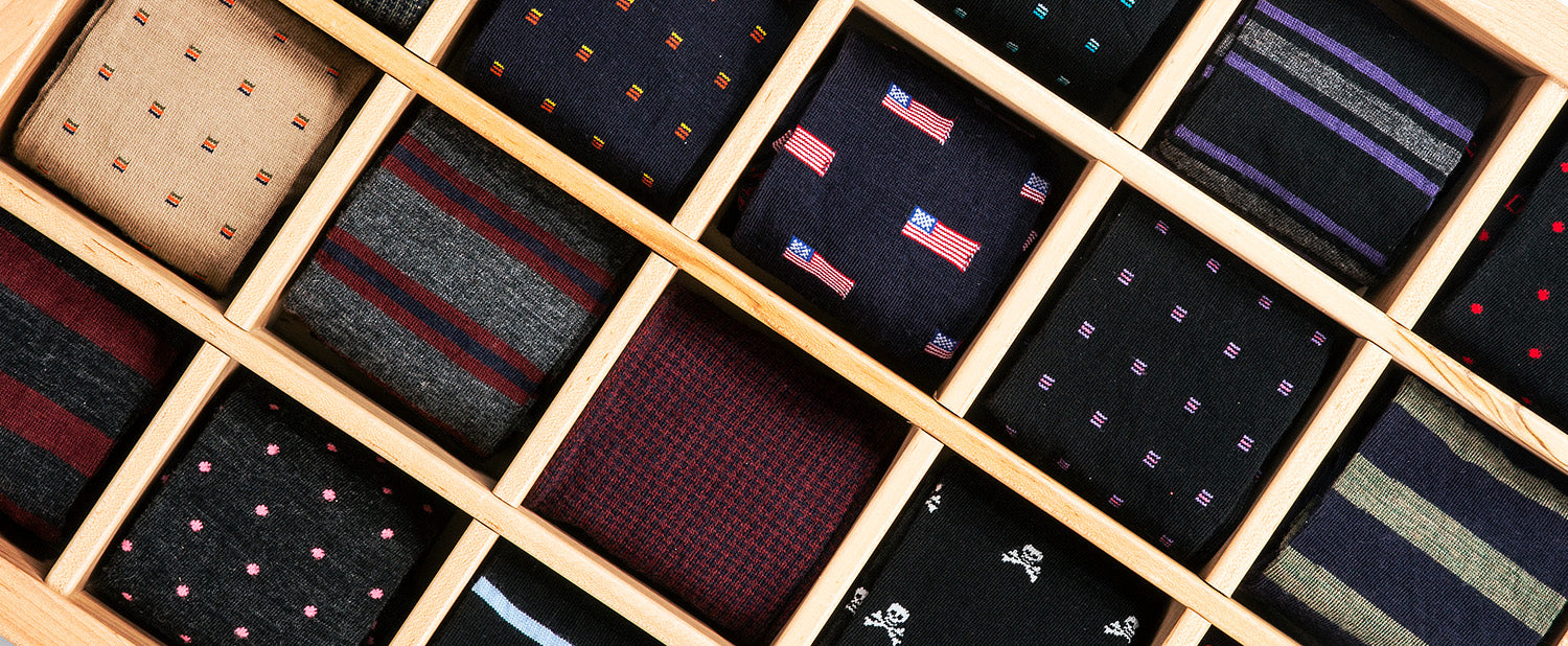 sock drawer organizer filled with colorful dress socks for men