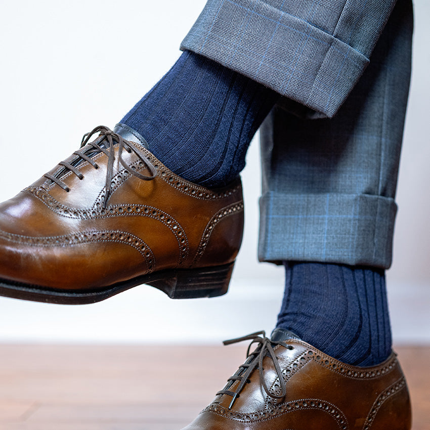 khaki merino wool patterned dress socks with olive green trousers and brown penny loafers