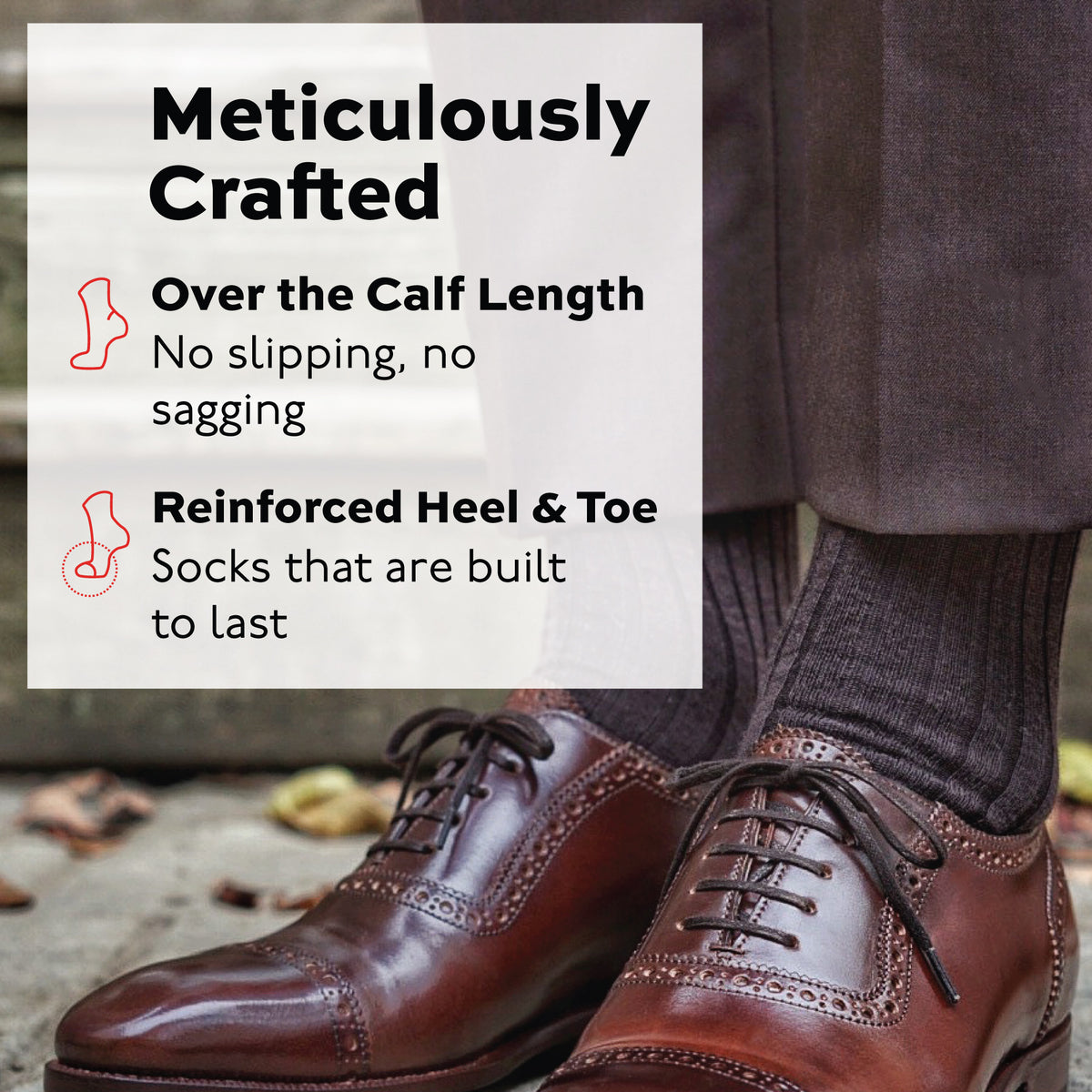 man standing outside wearing over the calf brown merino wool ribbed dress socks and brown pants
