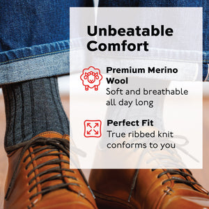 man standing wearing grey heather merino wool ribbed socks, nice shoes, and jeans