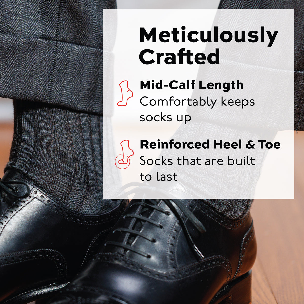 man wearing grey slacks, black oxfords, and grey merino wool mid calf ribbed dress socks