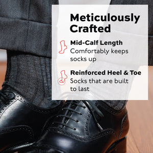 man wearing grey slacks, black oxfords, and grey merino wool mid calf ribbed dress socks