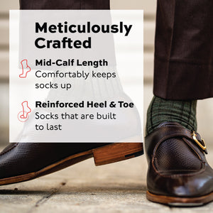 man standing wearing nicb brown pants and shoes with olive ribbed wmerino wool dress socks
