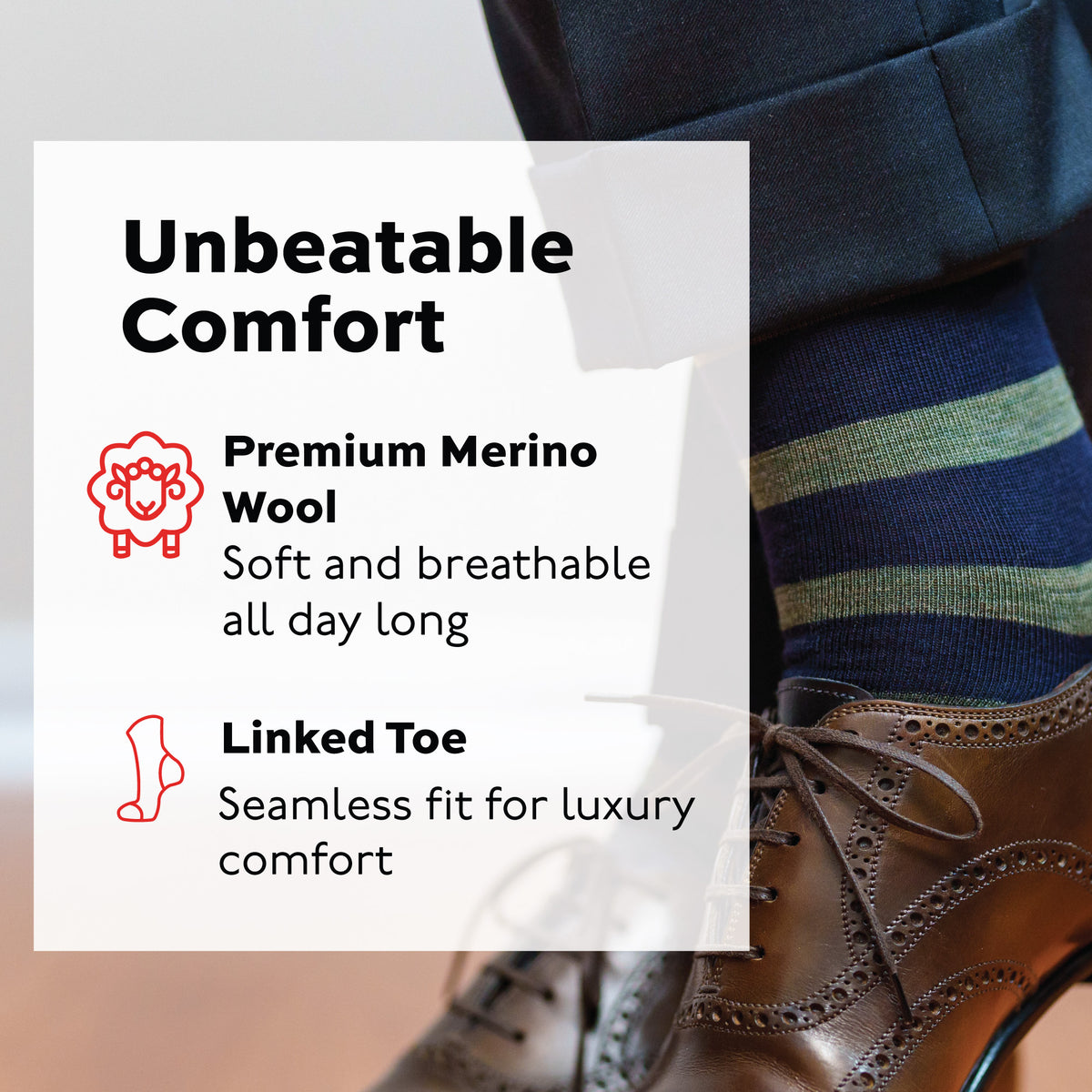 man crossing legs wearing navy and green striped merino wool dress socks with unbeatable comfort text overlay