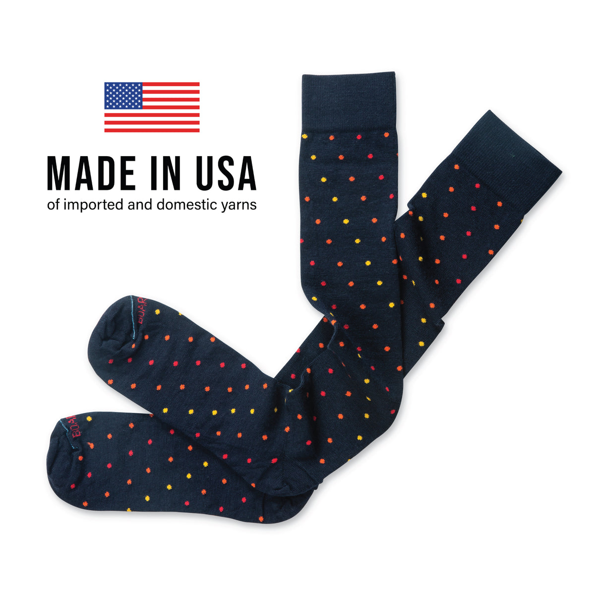 flat lay image of over the calf merino wool dress socks with made in usa text overlay