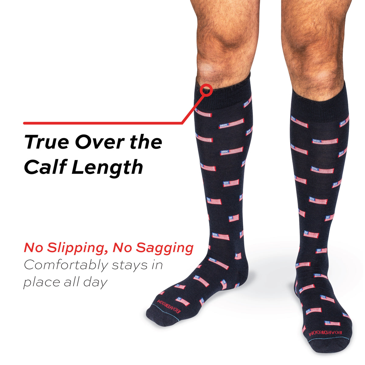 model wearing true over the calf length merino wool dress socks with an american flag pattern