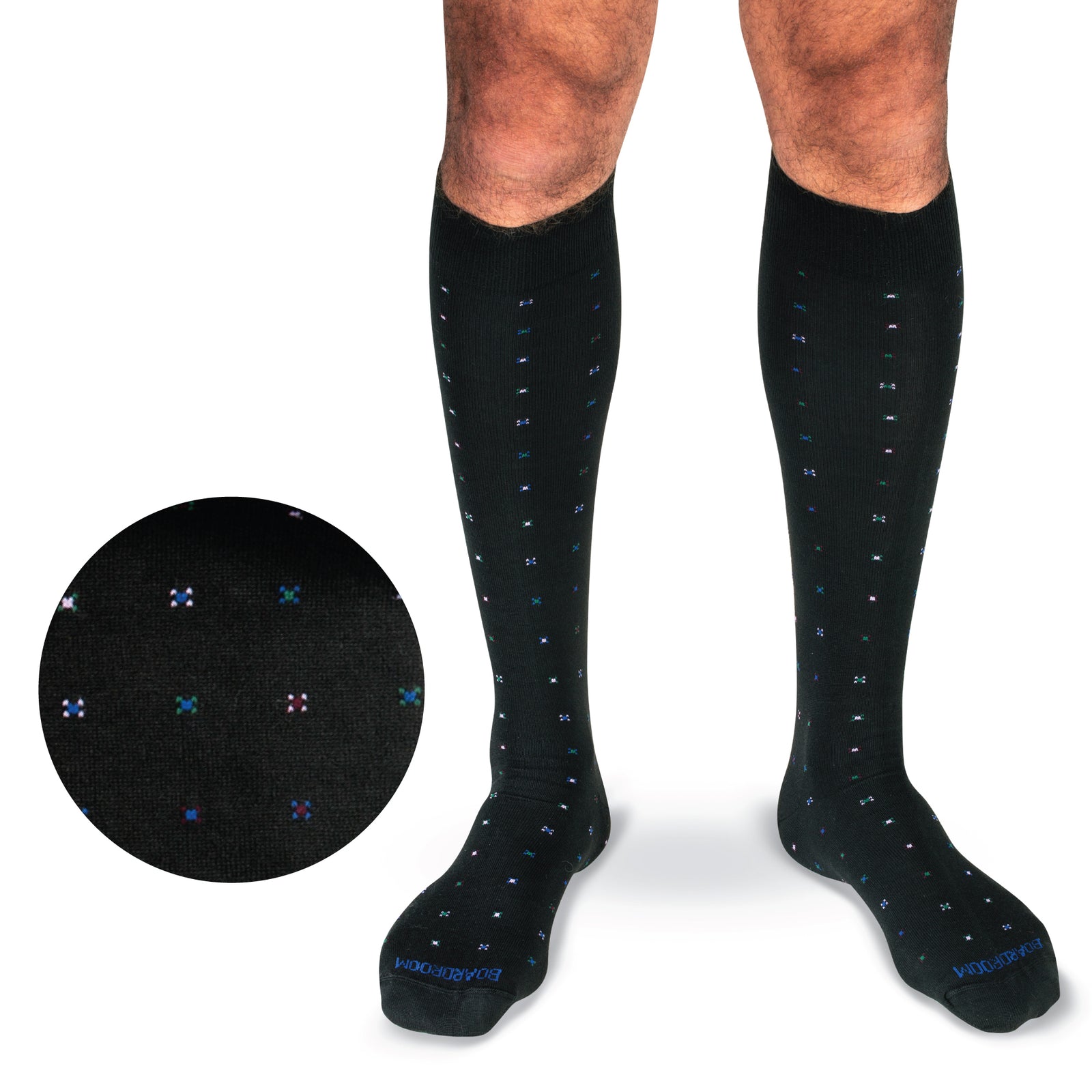 black cotton over the calf dress socks with a geometric pattern worn by a model