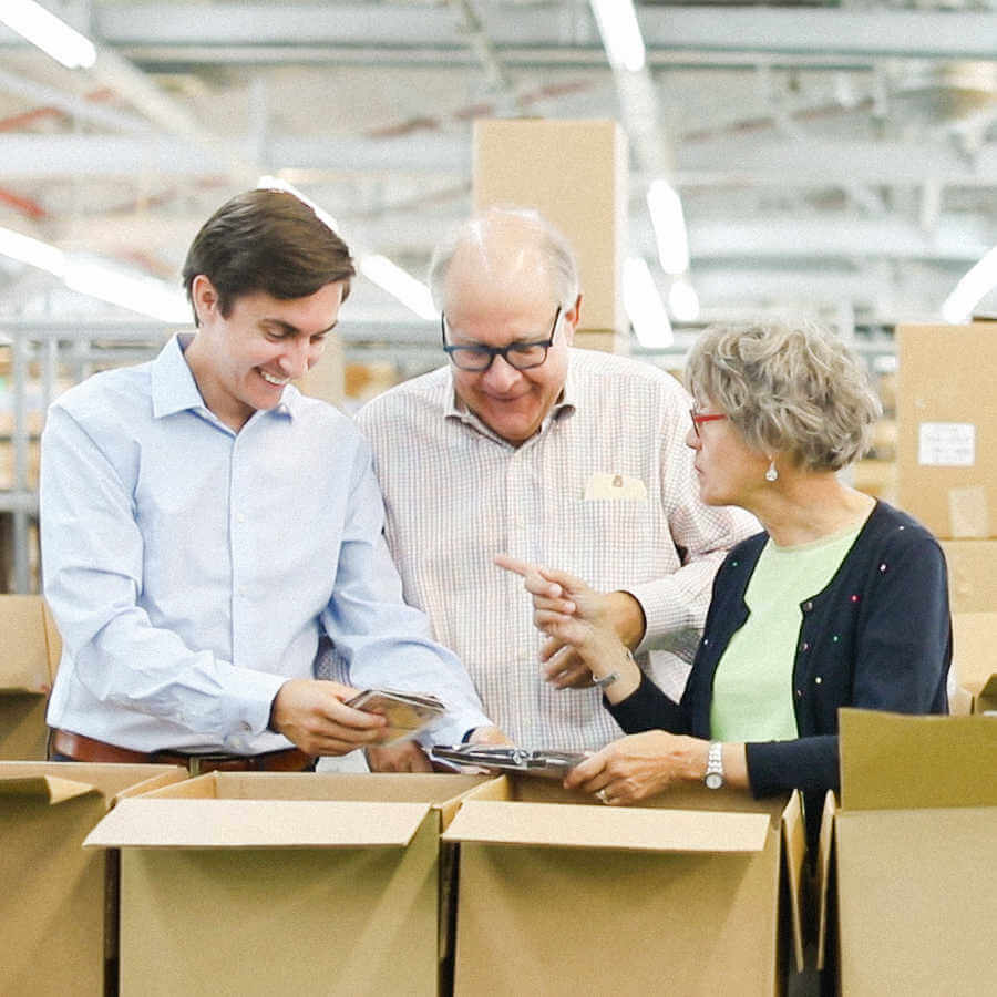 Boardroom Socks Family Smiling and Laughing in Warehouse