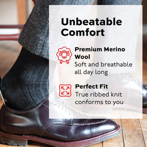 man putting on his shoe wearing perfect fit merino wool charcoal dress socks