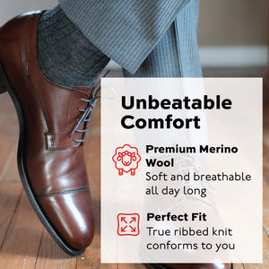 man crossing legs while standing wearing grey heather merino wool dress socks 