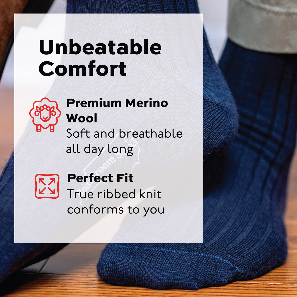 man wearing navy wool mid-calf dress socks showing ribbed texture and unbeatable comfort