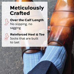 man wearing sky blue merino wool over the calf ribbed mens dress socks with infographic overlay