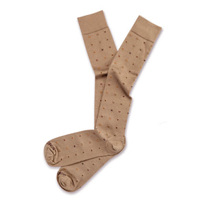 a pair of over the calf khaki cotton dress socks with a geometric pattern laying flat on white background