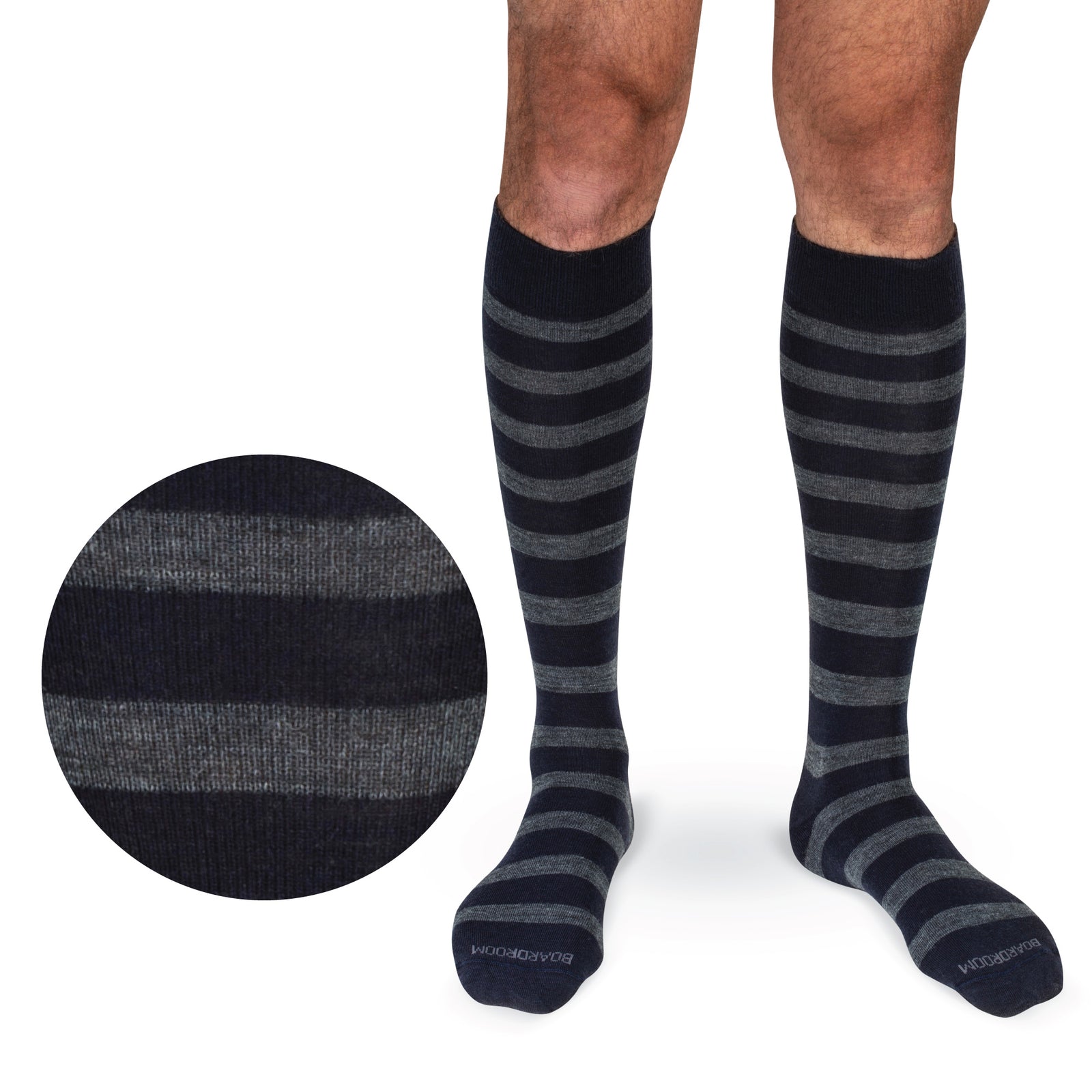 Model wearing Grey Heather Stripes on Navy Merino Wool Over the Calf Dress Socks on a white background