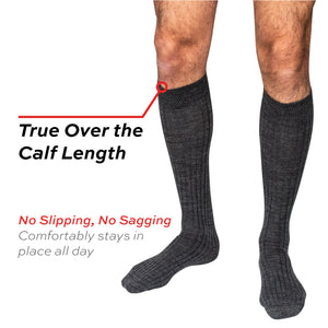 model wearing over the calf grey wool dress socks with call out of the true over the calf length and no slipping no sagging feature