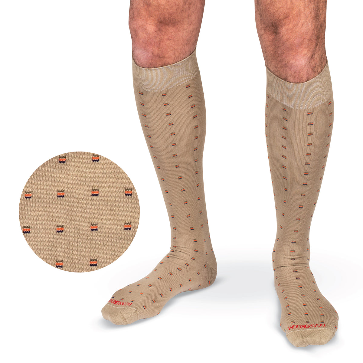 over the calf length cotton khaki mens dress socks with a square knot pattern worn on model 