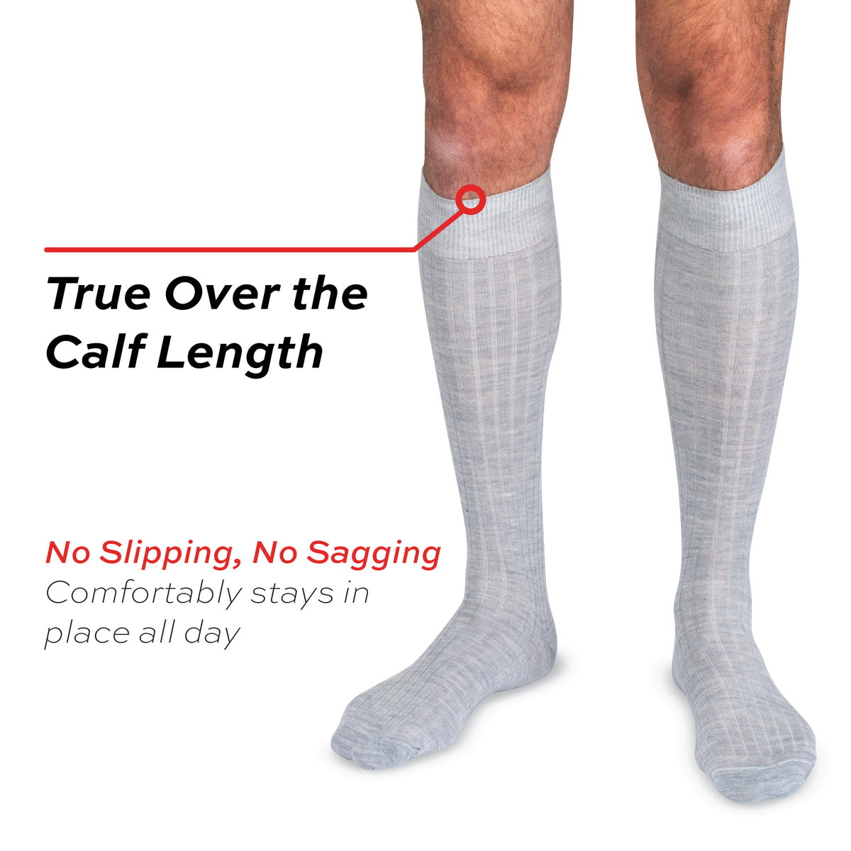 model wearing light grey merino wool over the calf dress socks on a white background with text overlays