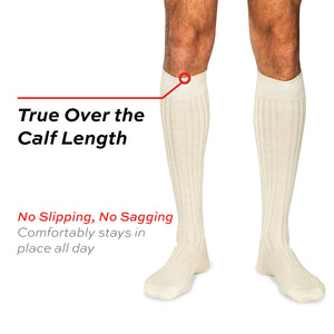model wearing natural merino wool over the calf ribbed mens dress socks on a white background