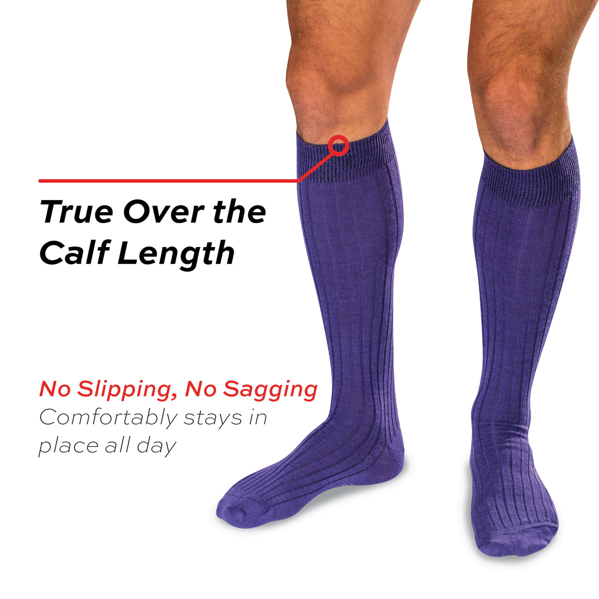 model wearing purple merino wool over the calf ribbed mens dress socks with text overlay
