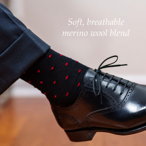 black and red wool dress socks paired with dark grey slacks and black oxfords