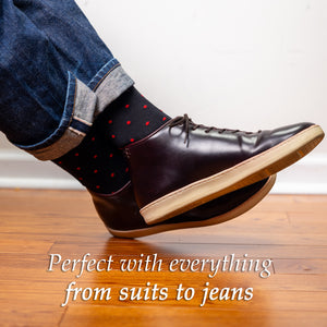 black and red patterned dress socks with jeans and dress sneakers