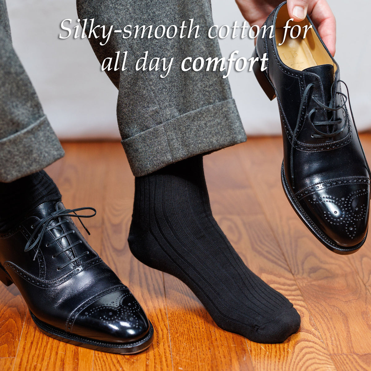 black oxfords with grey trousers and black cotton dress socks