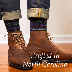 black merino wool Fair Isle socks paired with jeans and chukka boots
