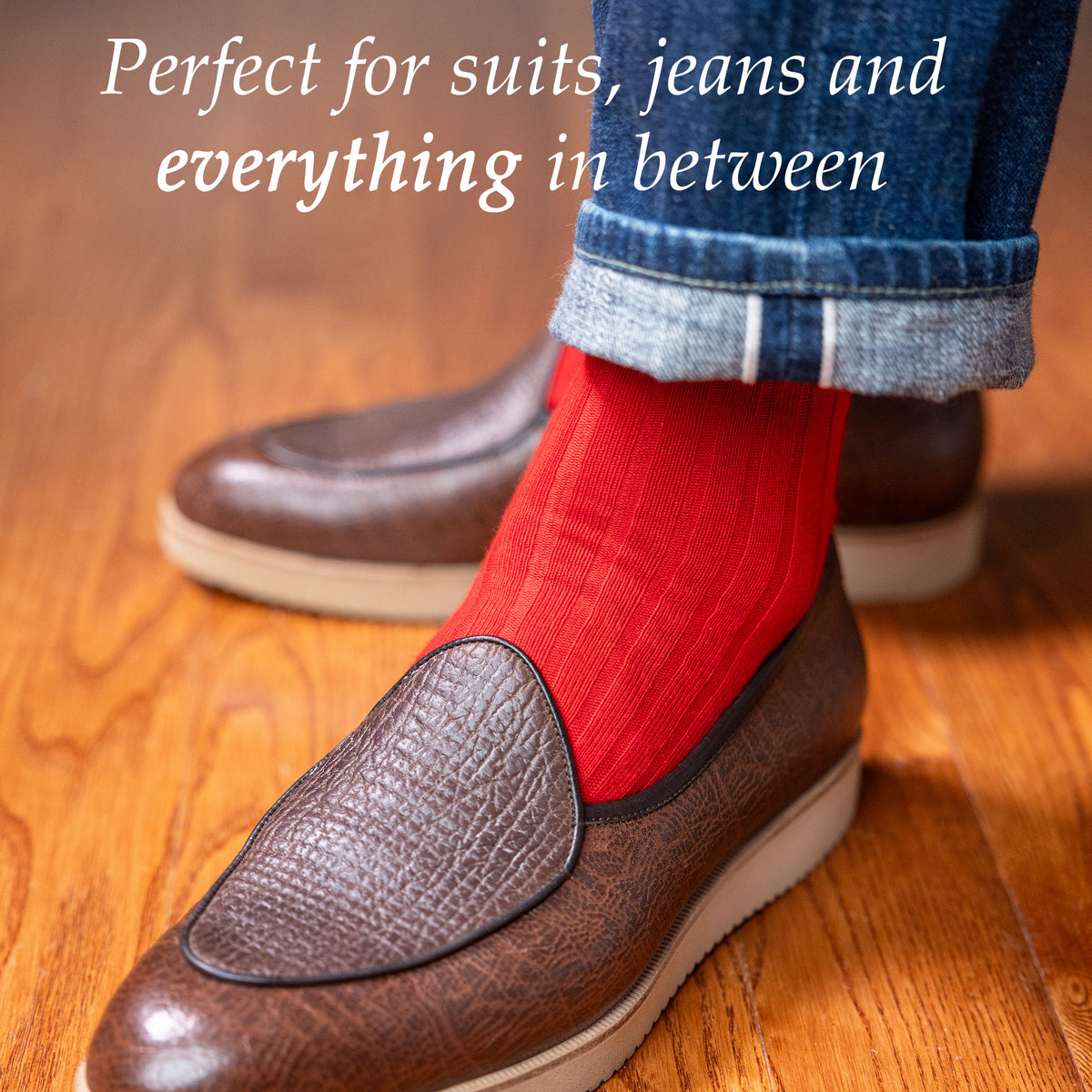 red ribbed dress socks with jeans and stylish loafer sneakers