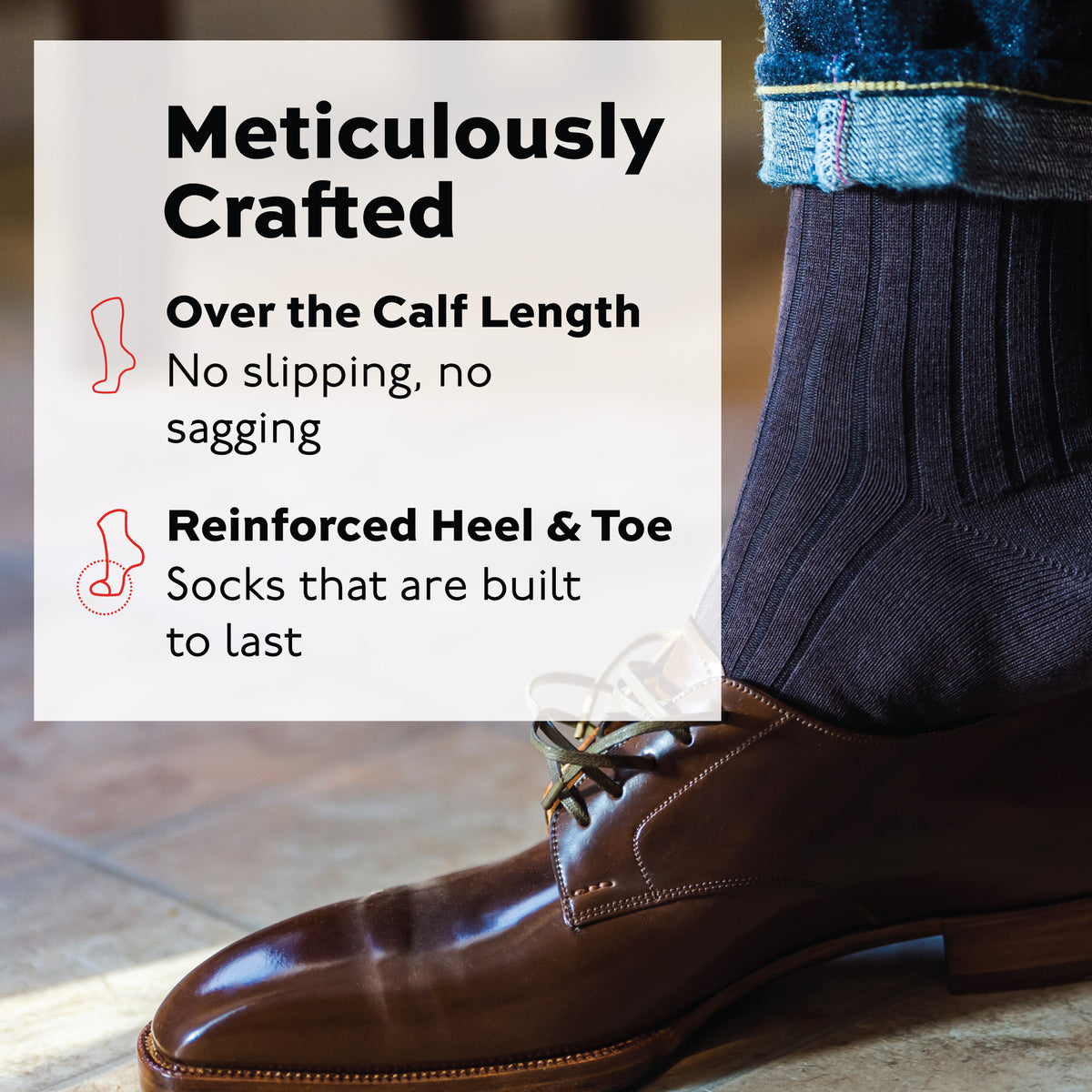 close up image of man wearing jeans and Brown Cotton Over the Calf Dress Socks putting on a brown dress shoe