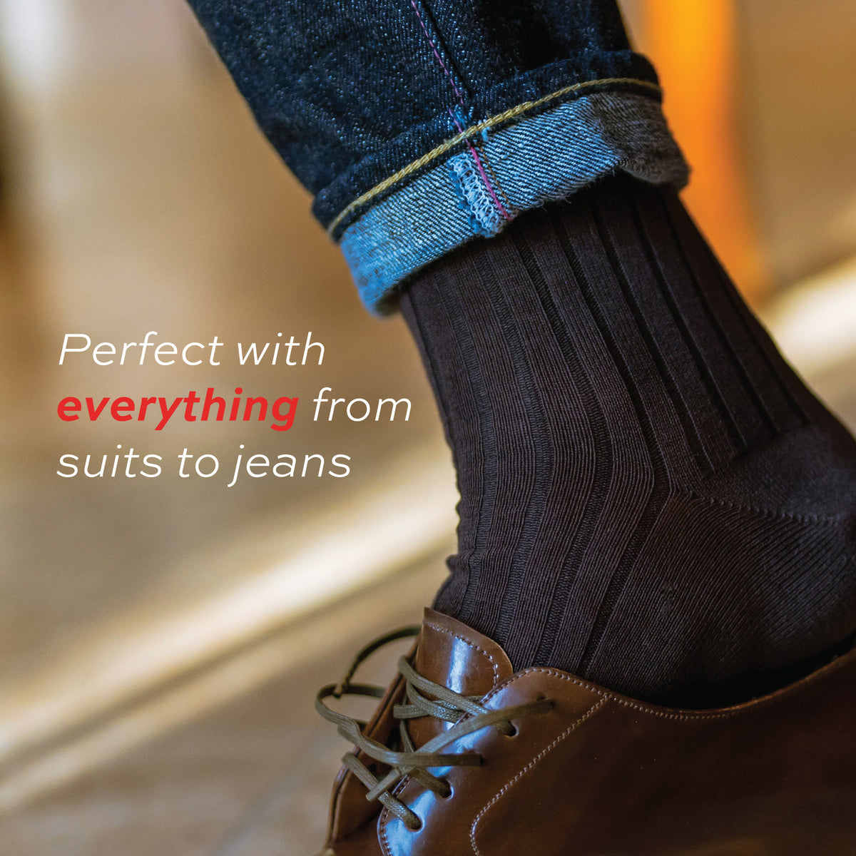 close up image of man wearing jeans, brown shoes, and Brown Cotton Over the Calf Dress Socks