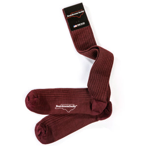 pair of burgundy merino wool over the calf dress socks from Boardroom Socks