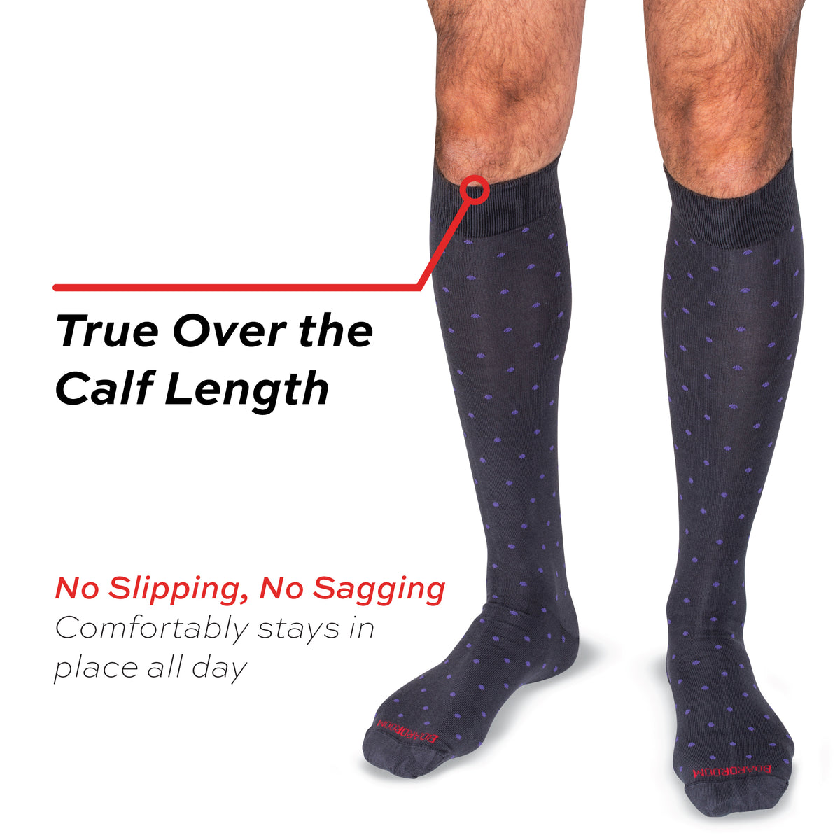 model wearing purple dots on grey cotton dress socks with no slipping, no sagging text overlay
